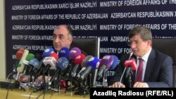 Azerbaijan - Azerbaijani Foreign Ministers Elmar Mammadyarov (L) and his Turkish counterpart Ahmet Davutoğlu during a joint press briefing in Baku, 15Oct2012.