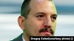 Dragos Cabat, economist