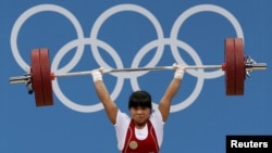 Kazakhstan's Zulfiya Chinshanlo won a gold medal in the women's 53-kilogram weightlifting group.