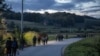 Migrants walk towards the Bosnia-Croatia border in attempt to cross it what they call "the game", near Velika Kladusa