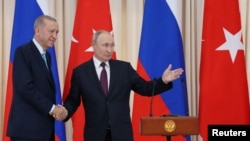 Turski predsjednik Erdogan i njegov ruski kolega Putin tokom konferencije za novinare u Sočiju