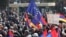 Armenia - An EU flag waved during an opposition rally in Yerevan, 1Mar2014.