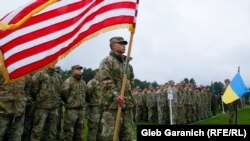 U.S. and Ukrainian soldiers attend the opening ceremony of a military exercise in Ukraine's western Lviv region in September 2021.