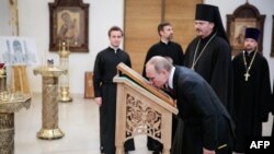 Vladimir Putin la Paris în vizită la Biserica rusă a Sfintei Trinități