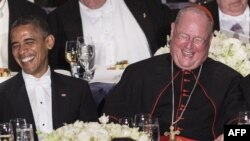Președintele Barack Obama și cardinalul Timothy Dolan, arhiepiscop de New York, în 2012