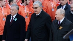 Russian President Vladimir Putin (right), Kazakh President Qasym-Zhomart Tokaev (center), and Uzbek President Shavkat Mirziyoev attend a military parade in Moscow. (file photo)