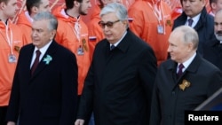 Russian President Vladimir Putin (right), Kazakh President Qasym-Zhomart Tokaev (center) and Uzbek President Shavkat Mirziyoev attend a military parade in Moscow. (file photo)