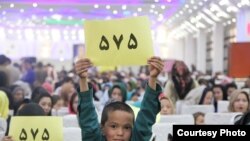 Afghan candidate Zuhra Nawrozi's supporters attend an indoor rally in Kabul.