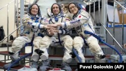 The current crew of the International Space Station: Russian cosmonaut Anton Shkaplerov (center), U.S. astronaut Scott Tingle (left), and Japanese astronaut Norishige Kanai