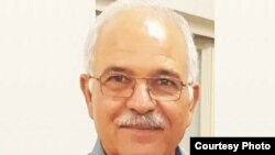 Farhang Amiri, 63, was murdered outside his home on September 26 2016 in the city of Yazd, Iran.