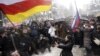 Разность в отношении к суверенитету вызвала ожесточенный спор в республике. Участники внутриполитического процесса хлещут друг друга по щекам, спорят, кто сильнее любит Россию и кто лучше знает, что есть благо для Южной Осетии