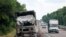 This charred truck is one of several destroyed vehicles that were photographed on June 19 along a highway running from Russia, into Russian-held territory in Ukraine. 