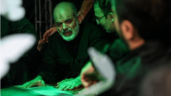 IRGC chief Ahmad Vahidi his respects in Tehran before the body of Ali Khamenei on July 3. 