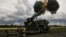 Ukrainian soldiers fire a French Caesar howitzer toward Russian positions on the front line in eastern Ukraine. (file photo)