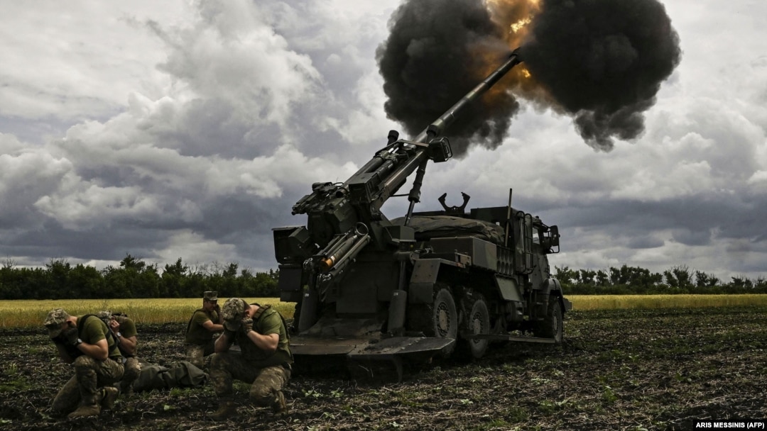 Ukrainian soldiers fire a French Caesar howitzer toward Russian positions on the front line in eastern Ukraine on June 15.