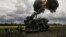 Ukrainian soldiers fire a French Caesar howitzer toward Russian positions on the front line in eastern Ukraine on June 15.