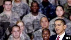 U.S. President Barack Obama greets U.S. troops during a rally at Osan Air Base, south of Seoul, today.