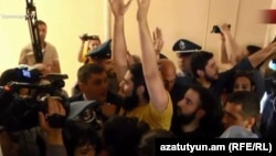 The demonstrators stormed Yerevan's City Hall on May 16