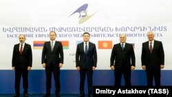 ARMENIA -- The prime ministers of Armenia, Belarus, Kazakhstan and Russia pose for a photo the start of a regular session of the Eurasian Intergovernmental Council, Yerevan, October 9, 2020.