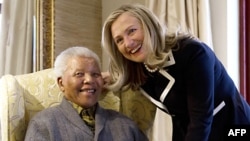 Then-U.S. Secretary of State Hillary Clinton at a meeting with Nelson Mandela at his home in Qunu in August 2012.