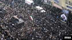 Tens of thousands of Iranians gather around a hearse carrying the coffin of former president Akbar Hashemi Rafsanjani during his funeral ceremony in the capital Tehran, January 10, 2017