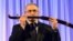 Russian former oil tycoon Mikhail Khodorkovsky receives a replica of a saber after he was awarded with the Knight of Freedom award by the Kazimierz Pulaski Foundation in Warsaw on December 3.