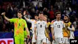 Lojtarët gjermanë duke festuar në Munih pas ndeshjes hapëse të Grupit A në Kampionatin Evropian 2024 mes Gjermanisë dhe Skocisë, të cilën e fitoi nikoqiri Gjermania 5:1, në Allianz Arena, 14 qershor 2024. 