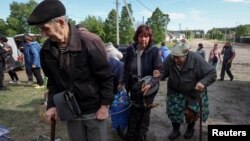 Sute de ucraineni au fost evacuați din Harkov. 
