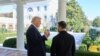 In this handout photograph taken on October 17, 2025 and released on October 18, 2025 by the Ukrainian presidential Press Service, US President Donald Trump (L) speaks with Ukraine's President Volodymyr Zelensky (R) at the White House in Washington, DC.