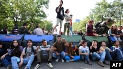 Armenia -- Demonstrators block a street during a protest against an increase of electricity prices in Yerevan, June 29, 2015