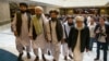 Mullah Abdul Ghani Baradar (third from left), the Taliban's top political leader, arrives with other members of a Taliban delegation for talks in Moscow on May 28, 2019. 