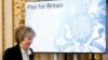 Între Brexit și globalizare: Theresa May la Davos