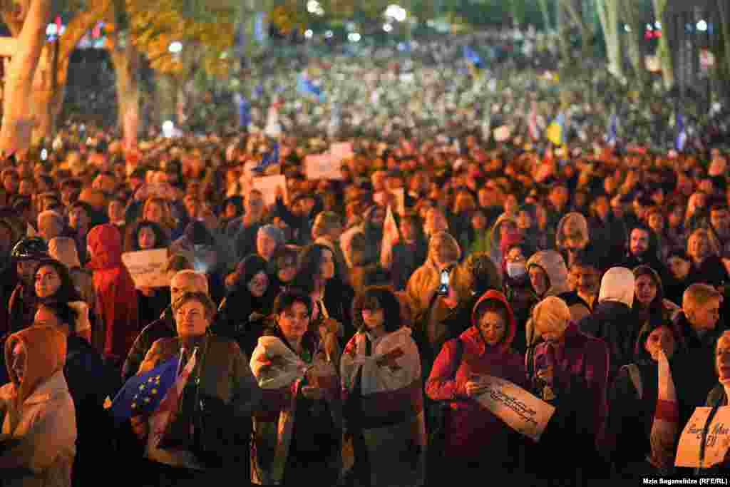 Tens of thousands of pro-Europe Georgians took to the streets of Tbilisi on October 20 to rally against the ruling Georgian Dream party, which has been accused of being Russia-friendly, ahead of parliamentary elections.