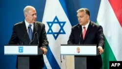 Бинямин Нетаньяху (слева) и Виктор Орбан (справа) (Будапешт 18 июля 2017 г.)