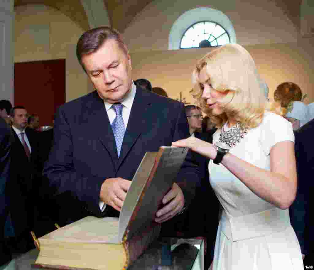 Ukrainian President Viktor Yanukovych takes part in the opening of an exhibition marking the 1,025th anniversary of the baptism of Kievan Rus on July 26.