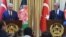Turkish Prime Minister Binali Yildirim (left) speaks next to Afghan Chief Executive Officer Abdullah Abdullah during a press conference at Sapedar palace in Kabul on April 8.