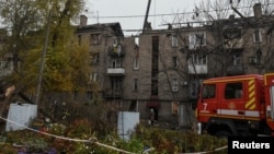 The site of an apartment building hit in a Russian drone strike in the city of Kamyanske, Dnipro region, Ukraine, on November 6.