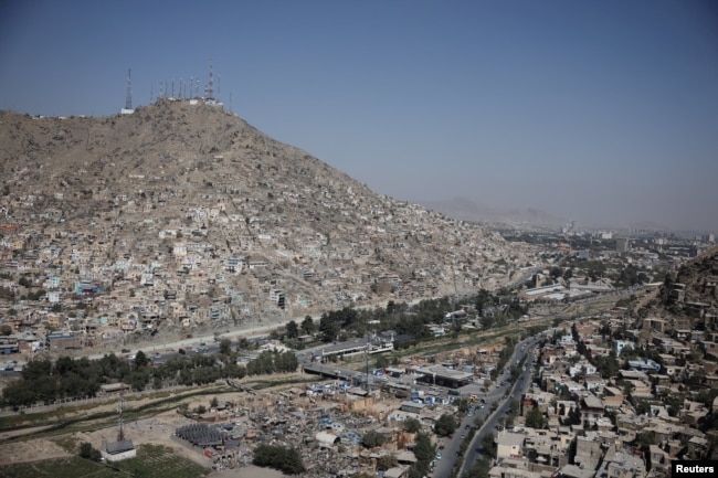 Telecom antennas on top of a hill in Kabul
