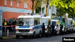 German special police gather near the El-Irschad (Al-Iraschad e.V.) center in Berlin, Germany, April 30, 2020, after Germany has banned Iran-backed Hezbollah on its soil and designated it a terrorist organization. 