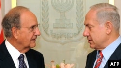 Prime Minister Benjamin Netanyahu (right) meets with U.S. Middle East envoy George Mitchell in Jerusalemin September