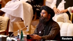 Mullah Abdul Ghani Baradar, who led the Taliban delegation in Doha, speaks at the commencement of peace talks with the Afghan government in Doha on September 12.