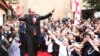 Georgia - Armenian Prime Minister Nikol Pashinian is greeted by people outside an Armenian church in Tbilisi, 30 May 2018.