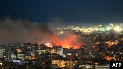 شعله‌های آتش در محل حمله هوایی اسرائیل در حومه جنوبی بیروت،ش بامداد جمعه ۱۵ اسفند