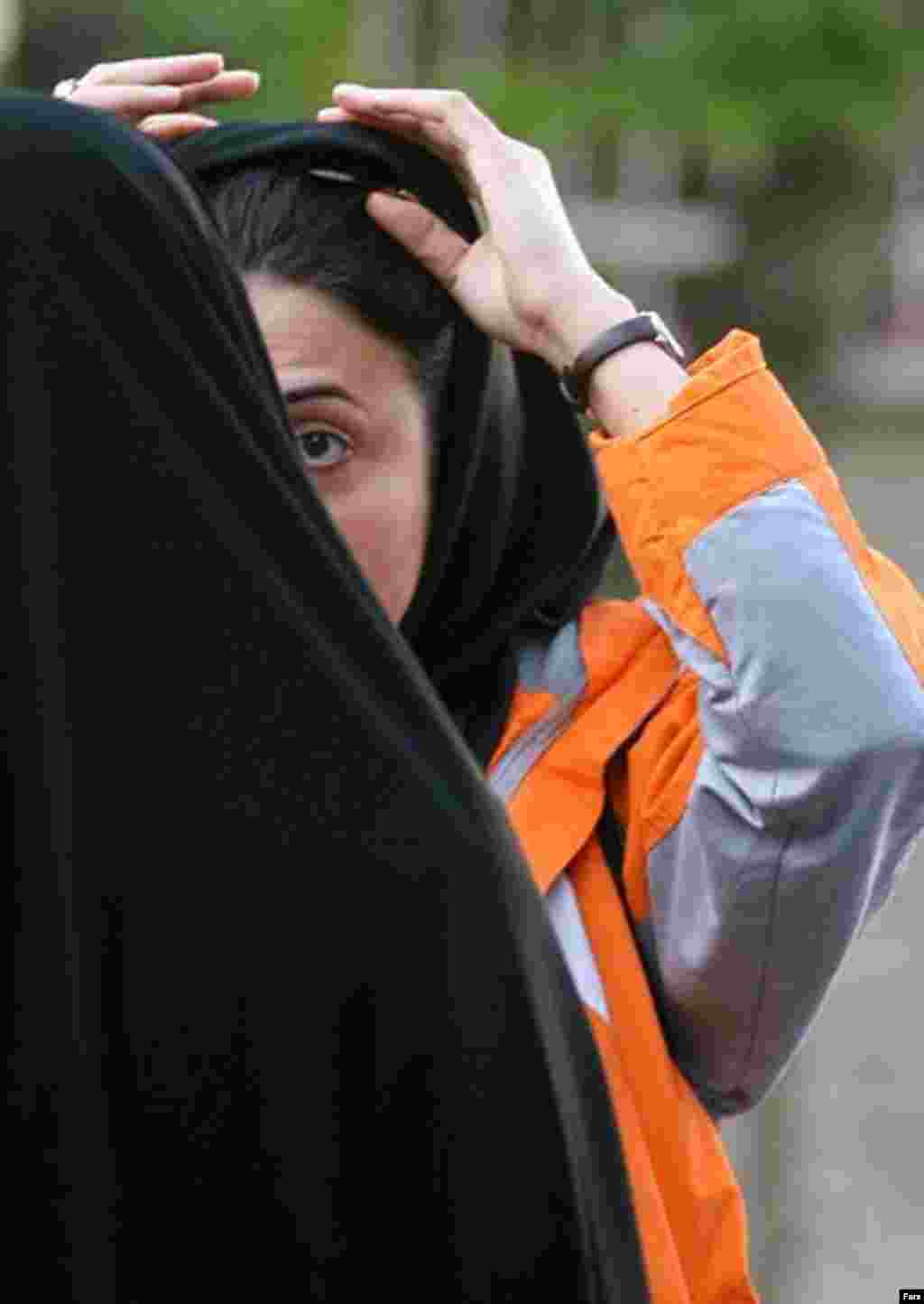 Police and Basij activists check women for proper dress in Tehran on April 22 (Fars) - This year's crackdown has drawn mixed reactions among officials, the public, and the press. The head of Iran's judiciary, Ayatollah Mahmud Hashemi-Sharudi, has warned against heavy-handed actions against women. He was quoted by Iranian newspapers as saying that "tough measures on social problems will backfire and have counterproductive effects."