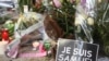 Импровизированный мемориал на месте убийства учителя Самюэля Пати, Конфлан-Сент-Онорин, 17 октября 2020