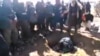 A grab from the video footage showing the stoning, which is alleged to have taken place in Afghanistan. 