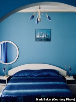 The interior of one of the first-floor suites at the Hotel Jiul in Craiova, Romania. Caught somewhere in the 1970s, the walls were creamy blue and the bedcovers a dark-blue velvet. David Lynch would have felt quite at home.