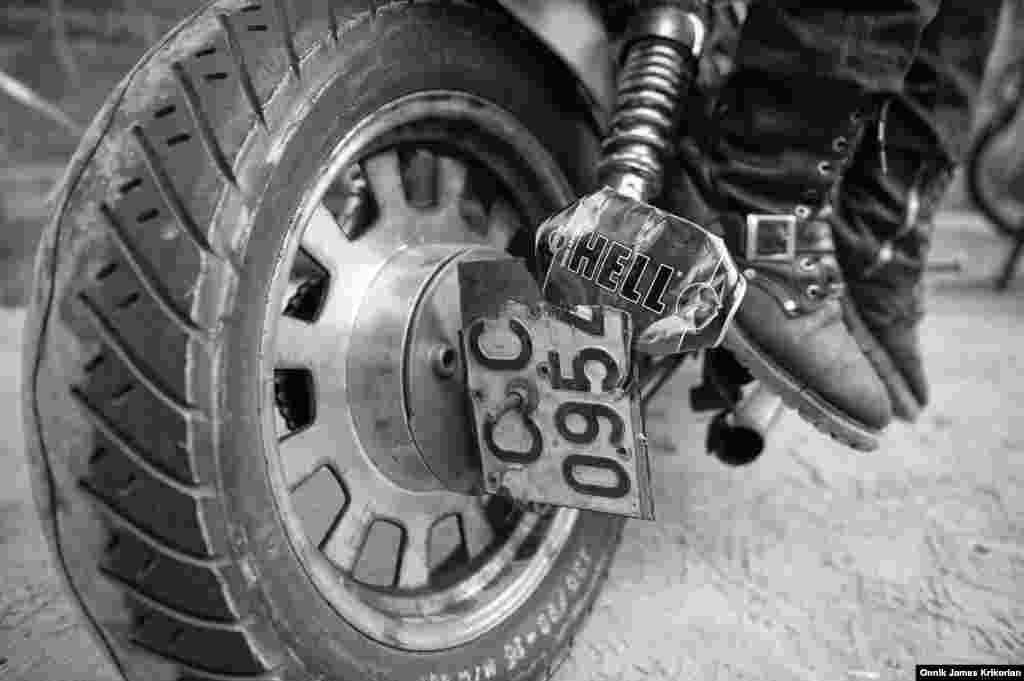 ‘Mad Dachi' Gachechiladze's makeshift number plate. He is recovering in hospital after being involved in a serious accident in Tbilisi. His passenger was fortunately thrown clear of the bike and suffered no injuries from the crash.