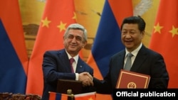 China - President Xi Jinping and his visiting Armenian counterpart Serzh Sarkisian adopt a joint declaration after talks in Beijing, 25Mar2015.