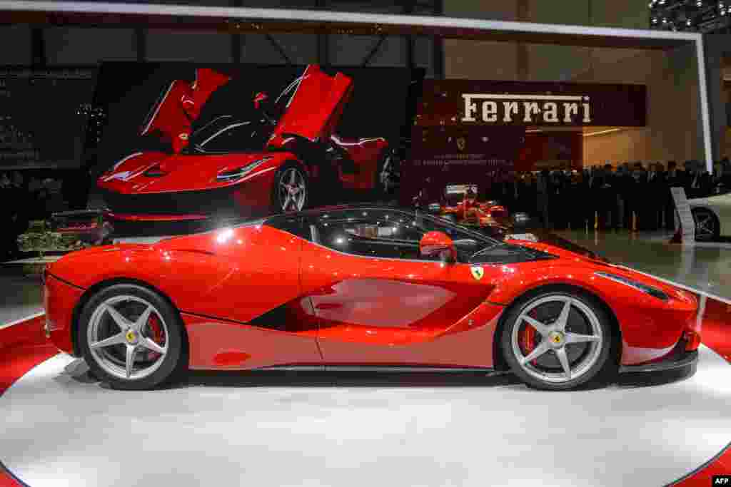 The new LaFerrari hybrid car can hit a top speed of 220 miles per hour, and costs $1.3 million.